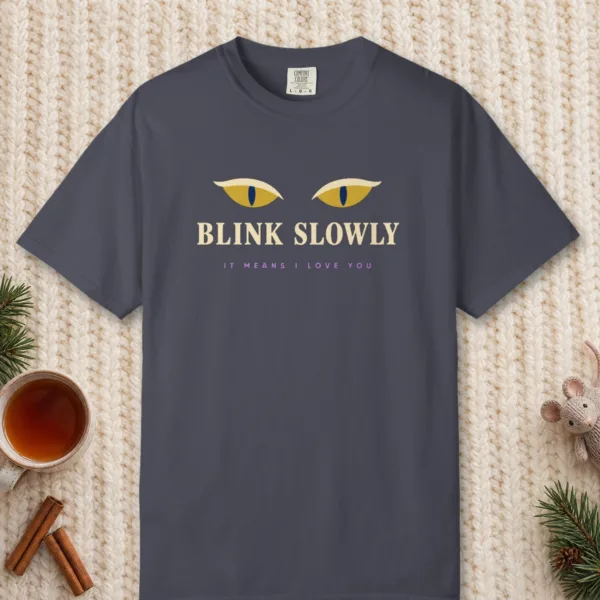 Blink Slowly design on a Navy Comfort Colors 1717 tee, laid flat