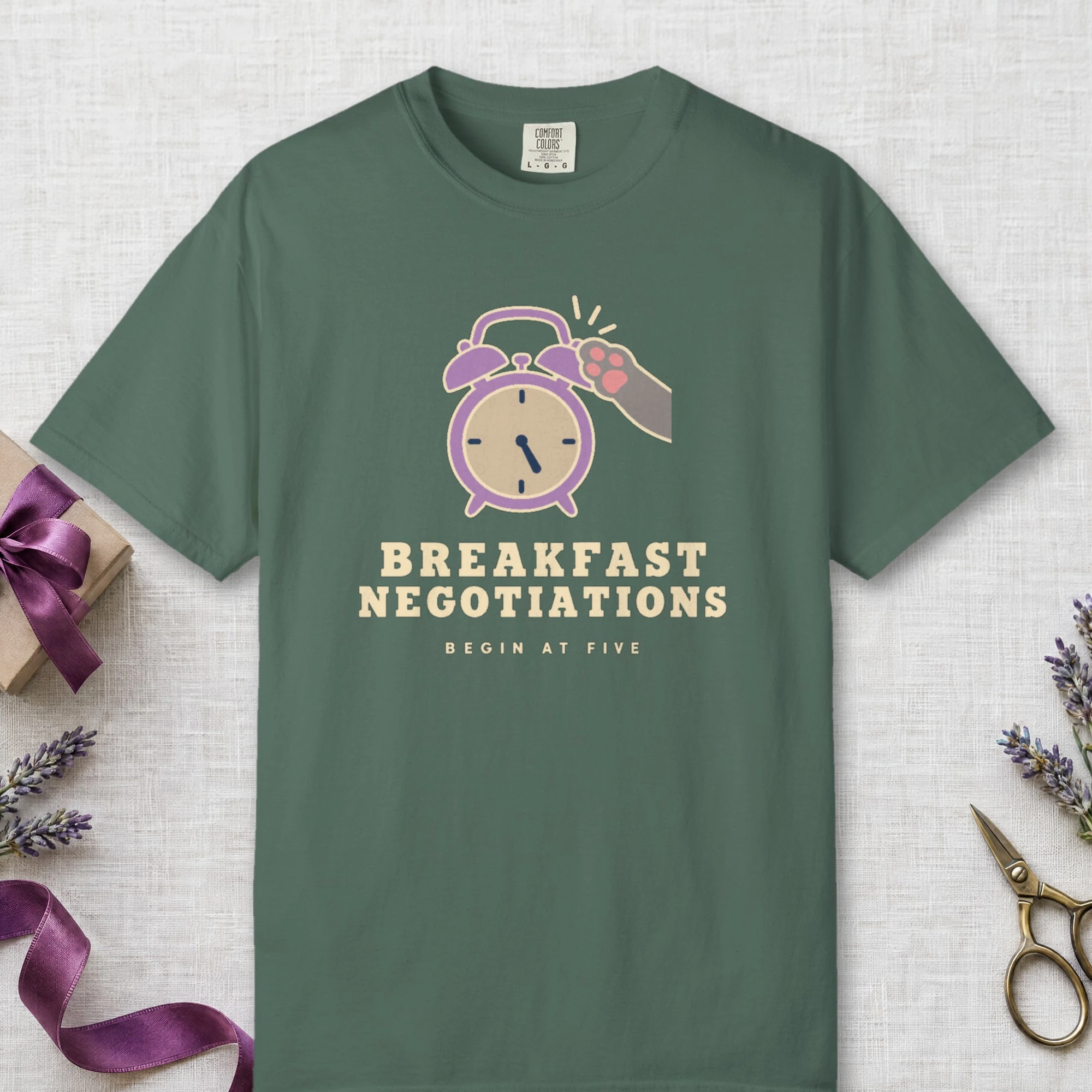 Breakfast Negotiations design on a Blue Spruce Comfort Colors 1717 tee, laid flat
