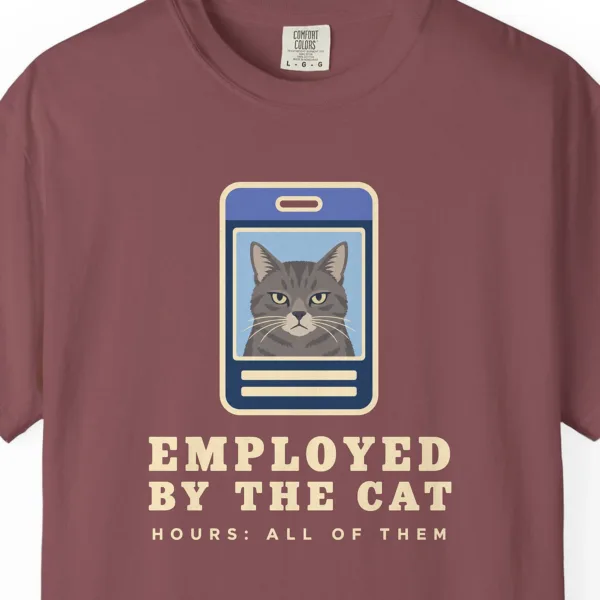 Close-up of the Employed by the Cat print on a Brick Comfort Colors 1717 tee