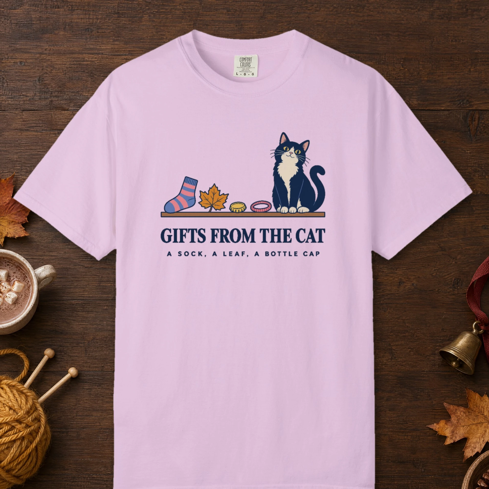 Gifts From the Cat design on an Orchid Comfort Colors 1717 tee, laid flat