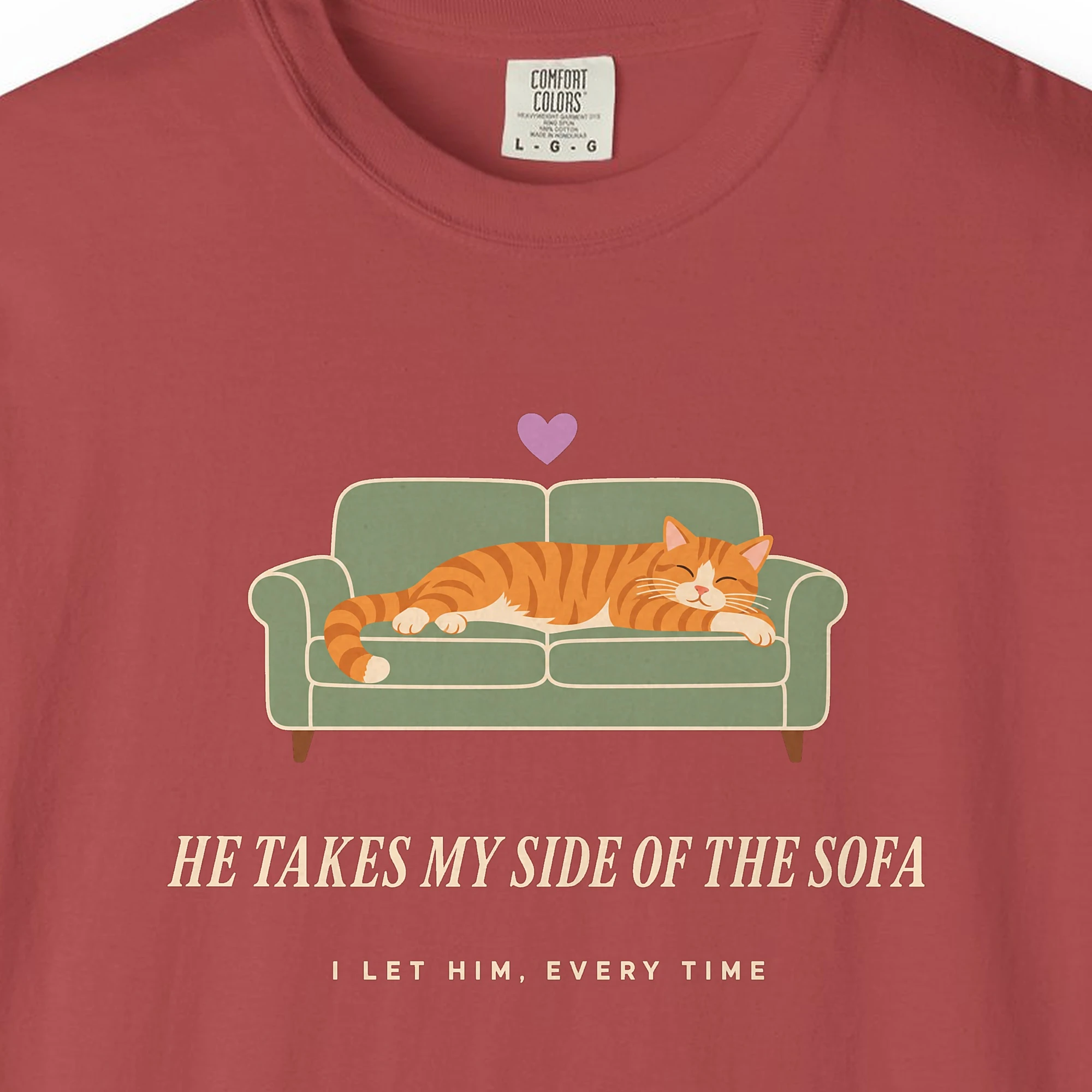 Close-up of the He Takes My Side of the Sofa print on a Crimson Comfort Colors 1717 tee