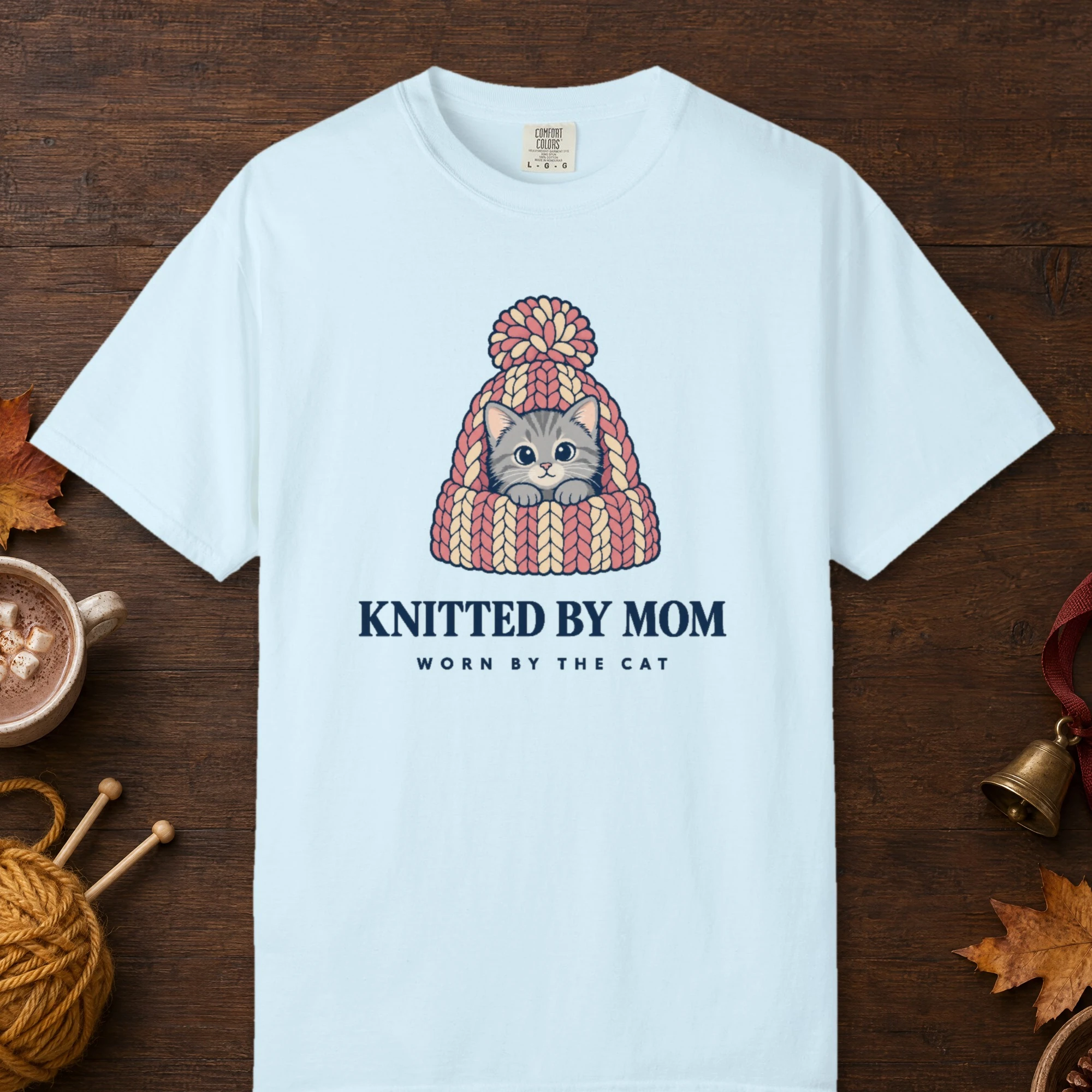 Knitted by Mom design on a Chambray Comfort Colors 1717 tee, laid flat