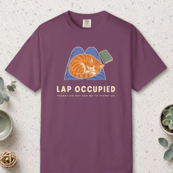 Lap Occupied design on a Berry Comfort Colors 1717 tee, laid flat