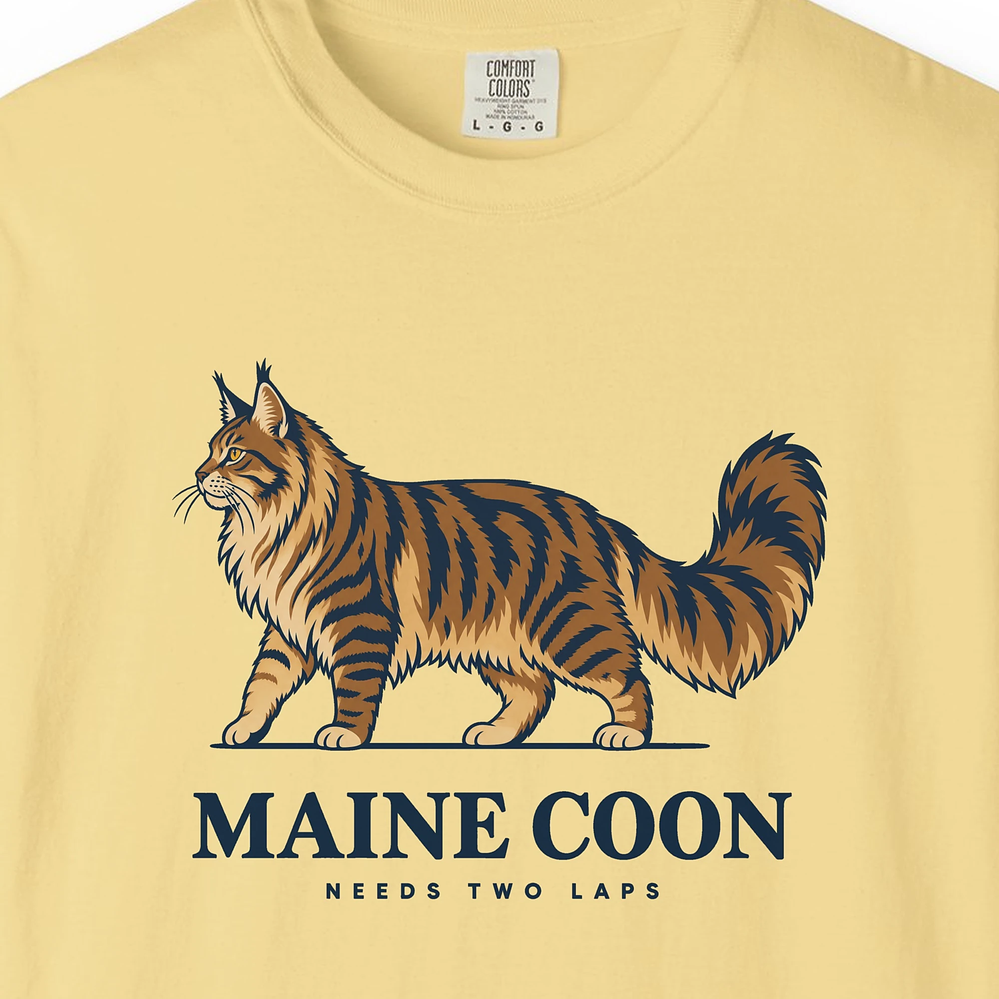 Close-up of the Maine Coon print on a Butter Comfort Colors 1717 tee