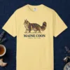 Maine Coon design on a Butter Comfort Colors 1717 tee, laid flat