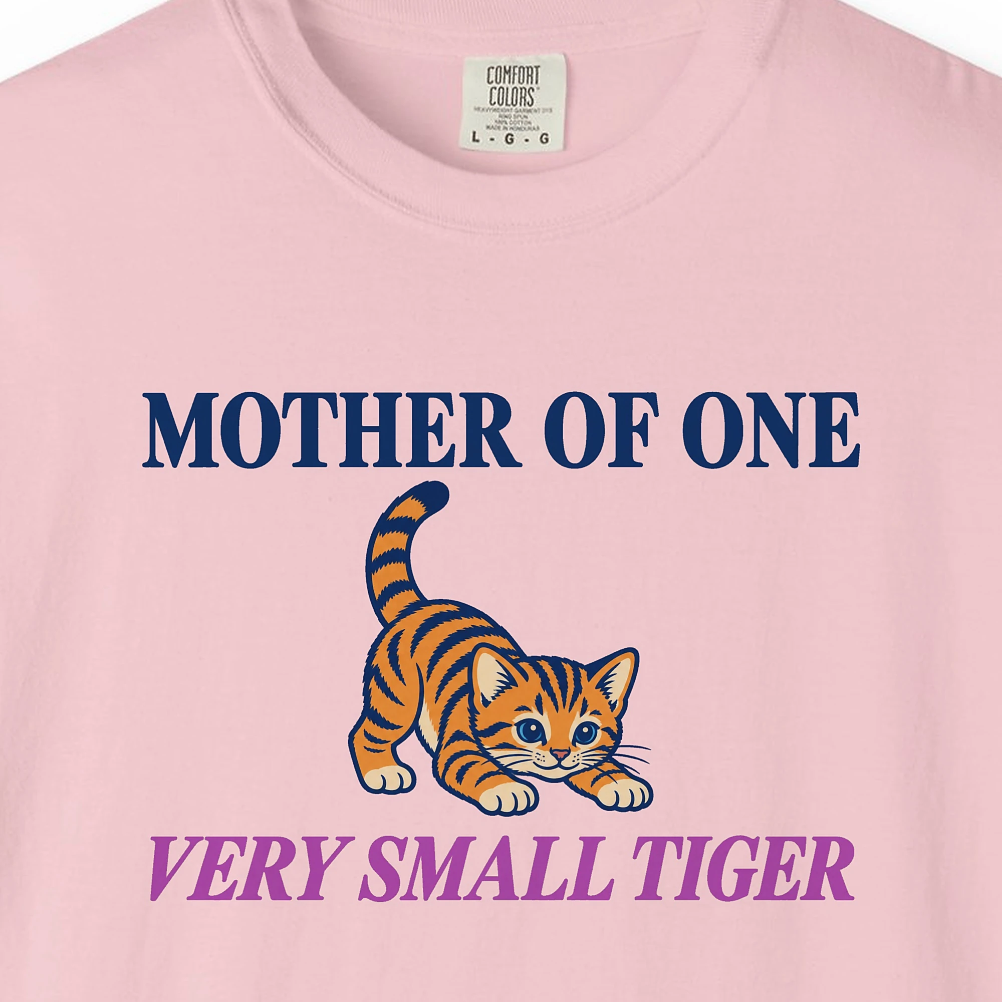 Close-up of the Mother of One Very Small Tiger print on a Blossom Comfort Colors 1717 tee