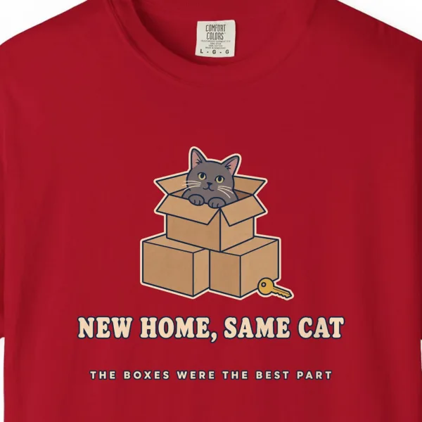 Close-up of the New Home, Same Cat print on a Red Comfort Colors 1717 tee