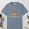 Sits on Books design on a Blue Jean Comfort Colors 1717 tee, laid flat