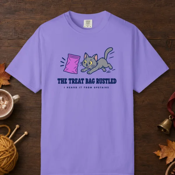 The Treat Bag Rustled design on a Violet Comfort Colors 1717 tee, laid flat