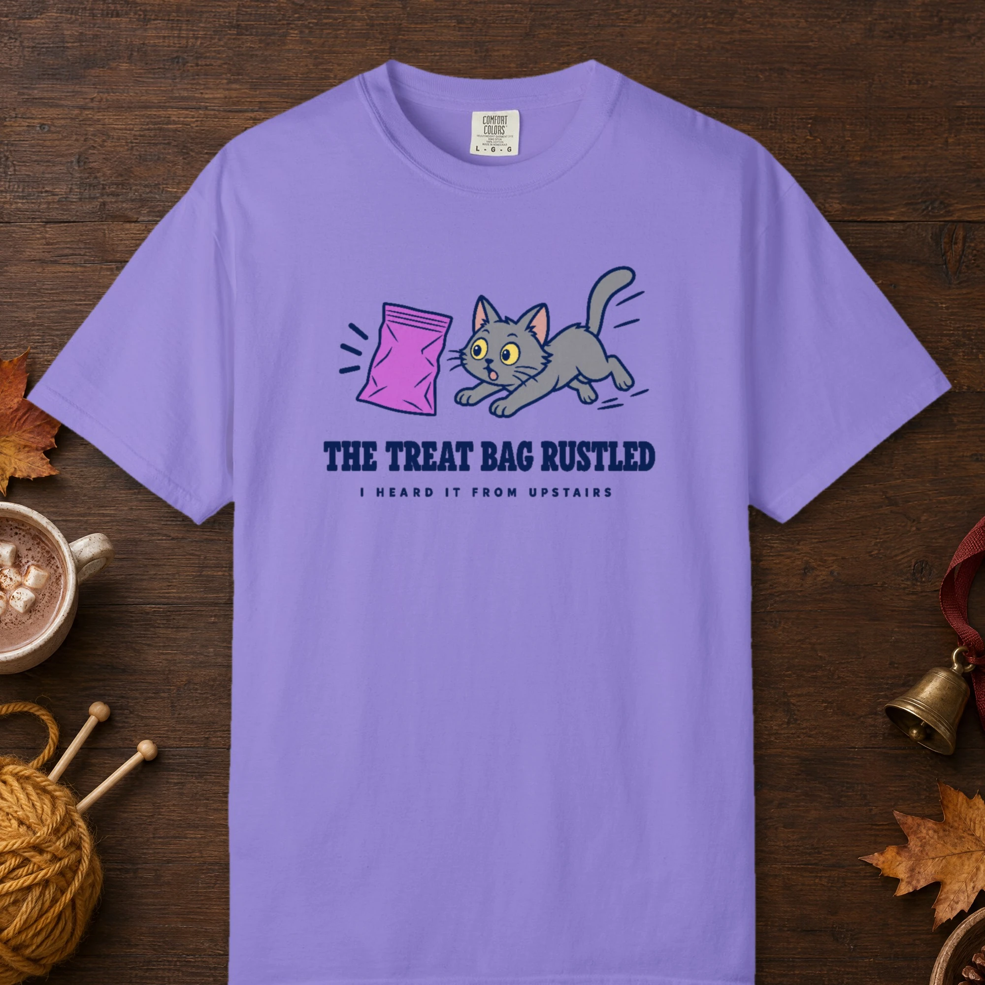 The Treat Bag Rustled design on a Violet Comfort Colors 1717 tee, laid flat