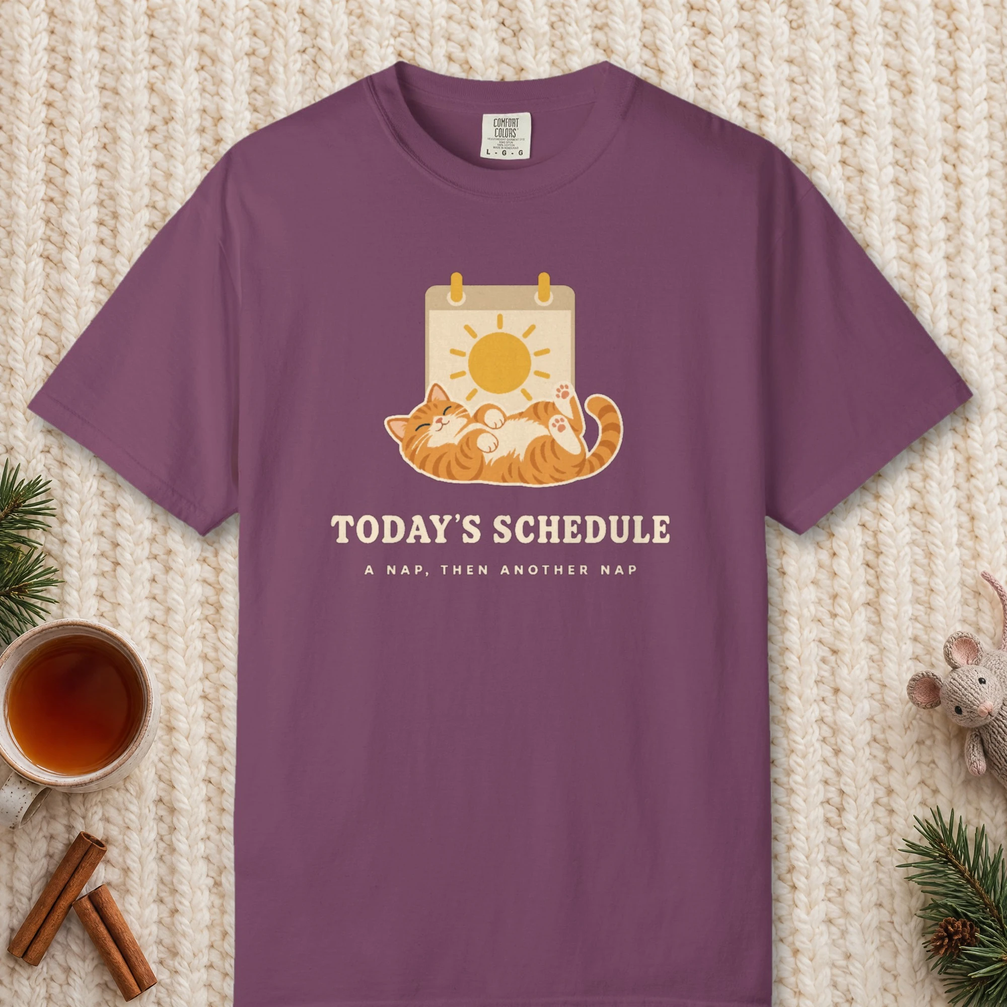 Today's Schedule design on a Berry Comfort Colors 1717 tee, laid flat