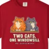 Close-up of the Two Cats One Windowsill print on a Red Comfort Colors 1717 tee
