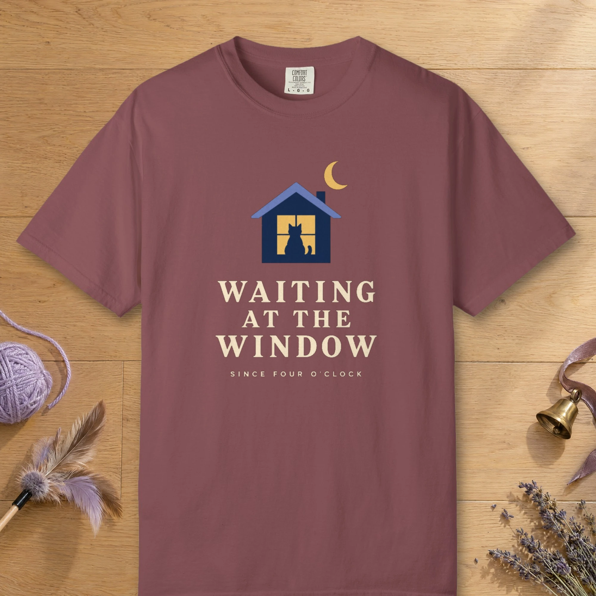 Waiting at the Window design on a Brick Comfort Colors 1717 tee, laid flat